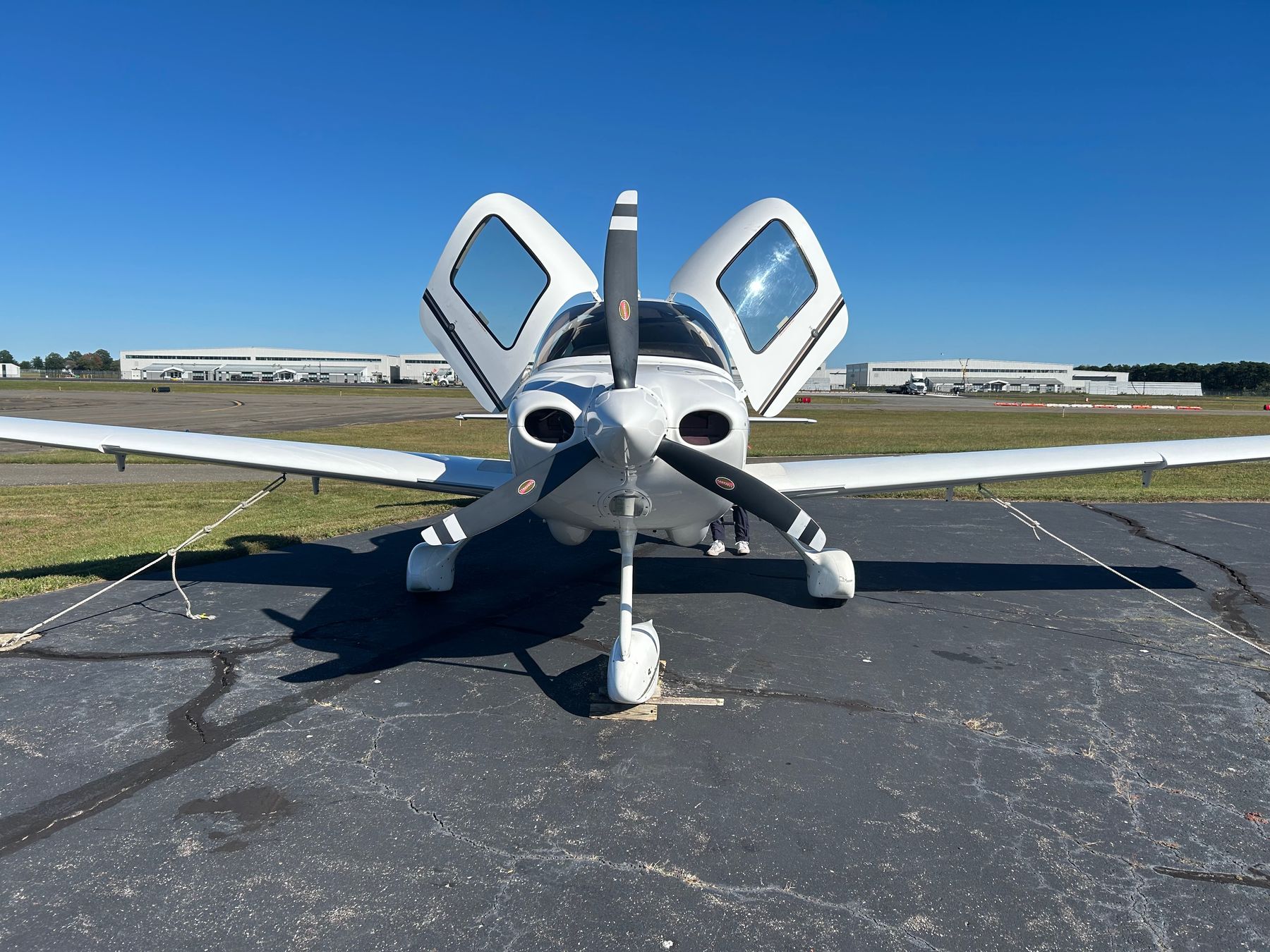 Head-on view of N299AT with both gull-wing doors raised